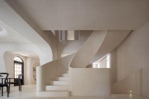 Modern interior design featuring concrete materials and minimalist aesthetic