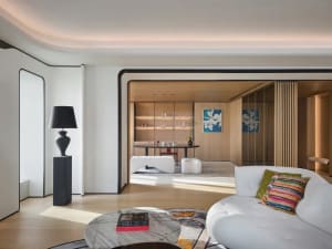 Modern living room featuring wood and marble materials and contemporary design elements.