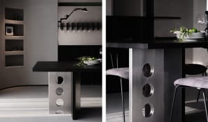 A modern black dining table with stainless steel details, alongside a black dining table with a metal base.