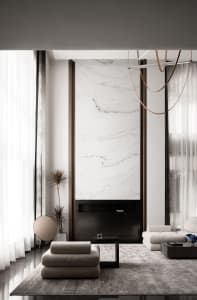 Modern minimalist living room with white marble accent wall, floor-to-ceiling windows, and contemporary furniture.