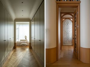 The minimalist hallway features wooden walls and flooring with a modern aesthetic.