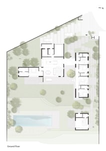 Floor plan of a modern residential layout featuring concrete and glass materials.