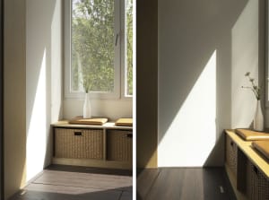 A minimalist window seat with wooden cushions and woven baskets, illuminated by natural light coming through the window.