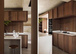 A modern residential kitchen featuring wooden cabinets, marble countertops, and a white island with a cat perched on it.