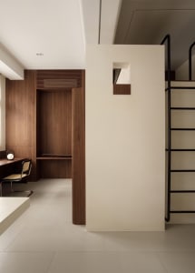 Modern minimalist interior design with wooden finishes and clean lines.