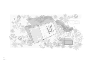Top-down view of a residential floor plan showing rooms and exterior details.