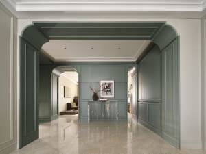 Modern living room interior with marble flooring, showcasing minimalist design elements.