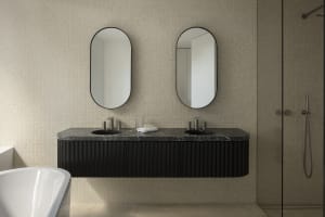 Modern black marble bathroom with sleek design and contemporary fixtures.
