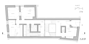 A detailed architectural floor plan of a modern bedroom suite with a focus on concrete materials.