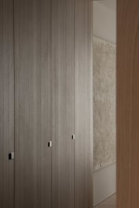 Modern interior design featuring wooden paneling and minimalist aesthetic