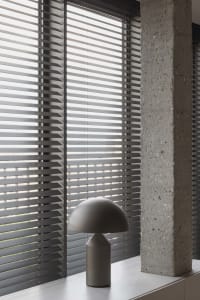 Image of a minimalist interior design featuring concrete elements.