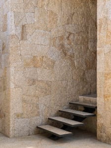 Modern stone staircase with industrial design elements