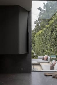 Modern interior space featuring minimalist design with concrete accents.