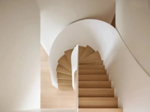 A minimalist staircase with wooden steps