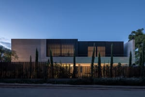 A modern residential house featuring metal-clad exterior.
