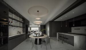 Modern kitchen featuring black appliances and marble countertop