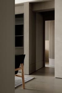 Modern minimalist floor interior with wooden flooring and minimalist design elements.