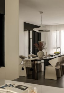Modern kitchen with metallic furniture and decor, featuring sleek, minimalist design and clean lines.