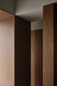 A modern interior space featuring wooden paneling materials.