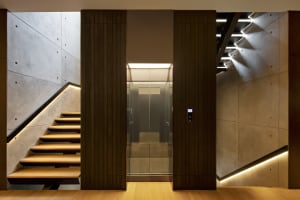 Modern interior design featuring concrete and wood materials