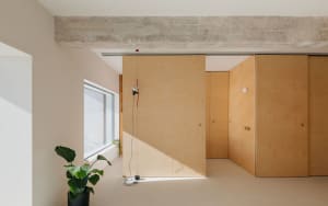 A modern living space featuring wood paneling