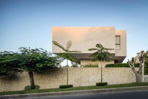 Modern residential exterior with sandstone cladding