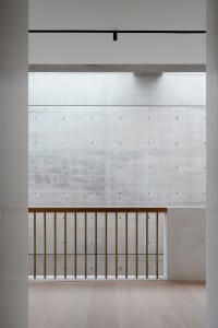 Modern office space featuring concrete and metal materials.