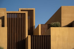 Modern architecture with concrete walls and vertical wooden slats