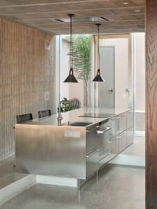 A modern kitchen with metallic features.