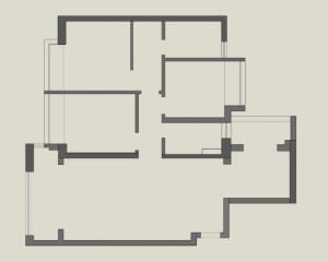 A 2D technical representation of a residential building layout with distinct rooms and hallways.