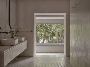 Modern minimalist bathroom with concrete and plaster finish
