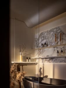 Modern bathroom interior with marble finishes