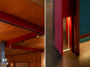 Modern industrial interior design featuring metal beams, concrete ceiling, and lighting fixtures.