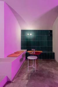 A vibrant interior space with colorful tiles and modern elements.