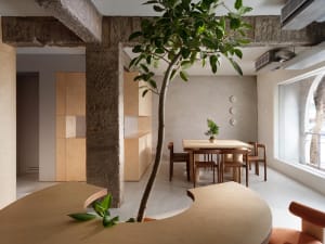 A modern coffee shop interior designed with wooden elements.
