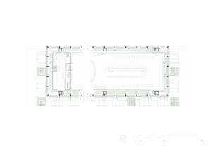 A modern office conference room with a central meeting table surrounded by chairs. The space features a mix of materials incl