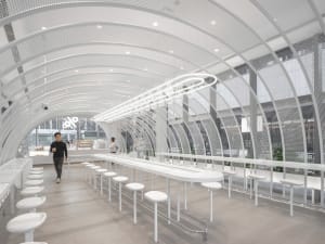 Modern coffee shop interior with white metallic frame.