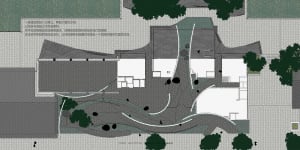 Minimalist house plan featuring concrete, wood, and glass materials.