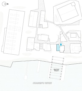 Floor plan showing urban landscape details on a paper sheet.