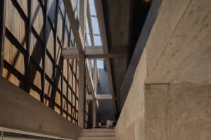 A modern interior with concrete and glass materials
