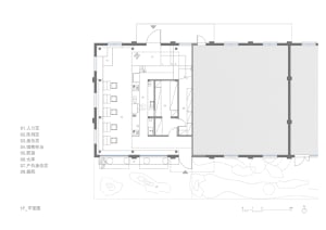 A detailed floor plan of a cafe bar, showing different zones such as entrance, seating, and kitchen areas.