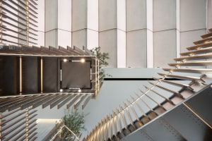A modern industrial office space with metallic elements and sleek design.