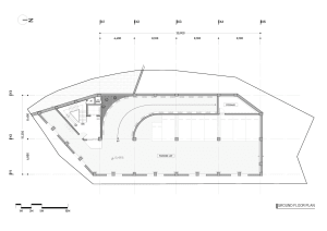 2D architectural drawing of an industrial ground plan with designated storage and parking lot areas.
