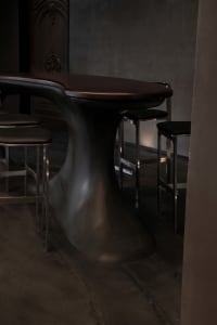 Modern bar stools made of metal and leather