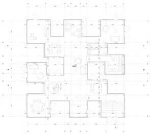 Floor plan of a residential building with various rooms and dimensions labeled.