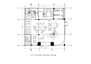 Blueprint layout of an office space showing individual desks and a central meeting area.