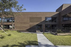 Modern office building with brick exterior and glass windows