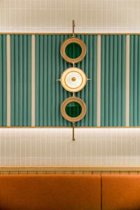 An industrial-style interior with glass and metal elements.