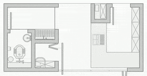 Floor plan of a modern residential space with a living room, kitchen, bedroom, and bathroom.
