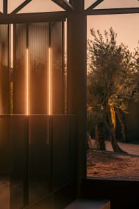 A minimalist outdoor space featuring metallic elements
